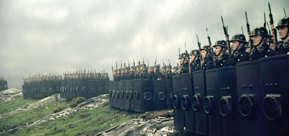 In a nod to ancient Roman formations, multiple racks of German SS troops are set up to begin the assault on Hadrian's wall. The studio built the massive set all indoors. AMAZING! (Photo: Flatiron Film Co.) Click to enlarge.